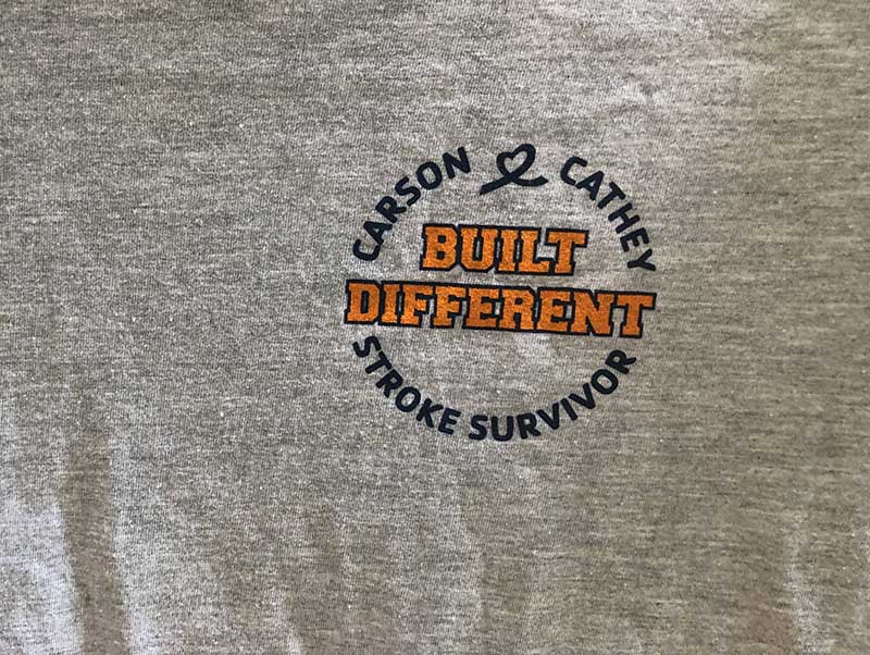 The logo on the front of a T-shirt that Carson Cathey's family made to commemorate his recovery (Photo by Genaro C. Armas)