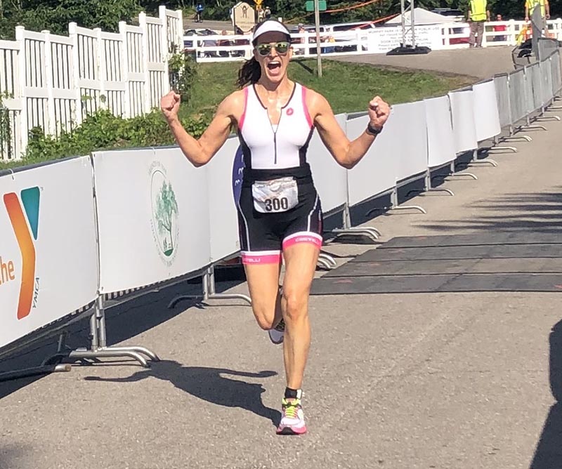 Erin Ivory crosses the finish line at a Wisconsin event in 2019. (Photo courtesy of Erin Ivory)