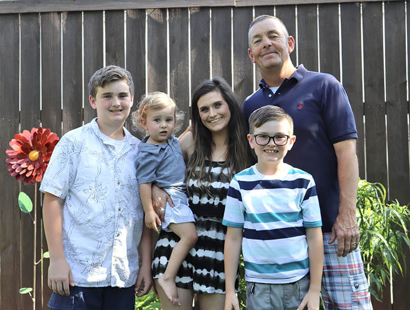 Danny Saxon (far right) with his family, from left: sons Keegan and Kole, wife Morgan and son Kyler. (Photo courtesy of the Saxon family)