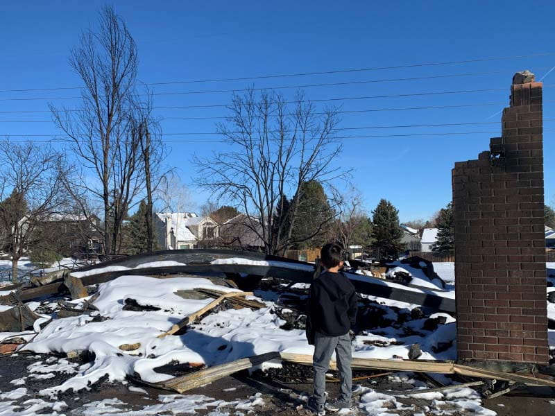 On New Year's Day, Reina Pomeroy's 7-year-old son saw what was left of his home in Louisville, Colorado, after a wildfire ripped through the area. (Photo courtesy of the Pomeroy family)
