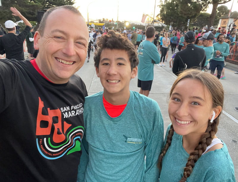 Dr. Steven Lome (left) with two of his children, Ian and Jadyn, before the Monterey Bay Half Marathon in 2022. (Photo courtesy of Dr. Steven Lome)