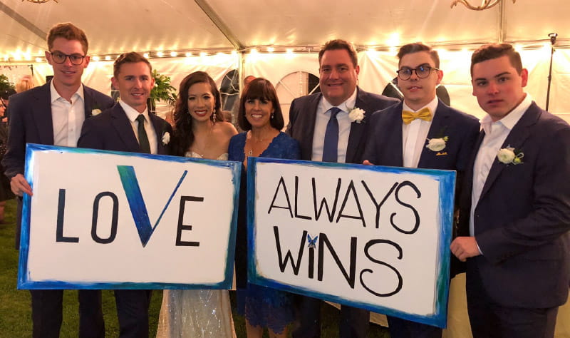 Tiffany and a friend painted these signs bearing “Abbie’s Law” as a way of including her in her brother Kyle's wedding. From left: Matt, Chase, Kyle's bride Victoria, Tiffany, Ray, Kyle and RJ. Kyle and Victoria now have twin daughters. Tributes to Abbie are embedded in their names: Stella Nova (