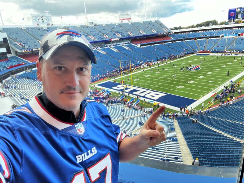 Buffalo Bills season ticket holder Russ Lyons, a former AED salesman, reached out to the team to see how he could help in the wake of Damar Hamlin's on-field cardiac arrest. Here he is at a game with friends who have gathered for more than 20 years to see the Bills play. (Photo courtesy of Russ Lyons)